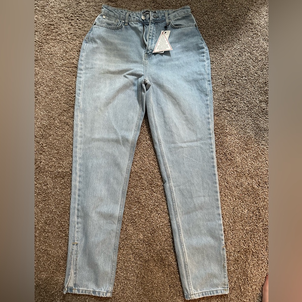 Boohoo light washed jeans with small foot slit